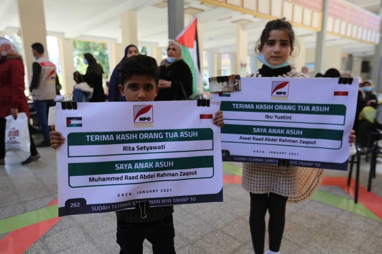 Dalam Bentuk Tunai: NPC Berbagi Santunan OTA Tahap ke-10 untuk 706 Anak Yatim Palestina
