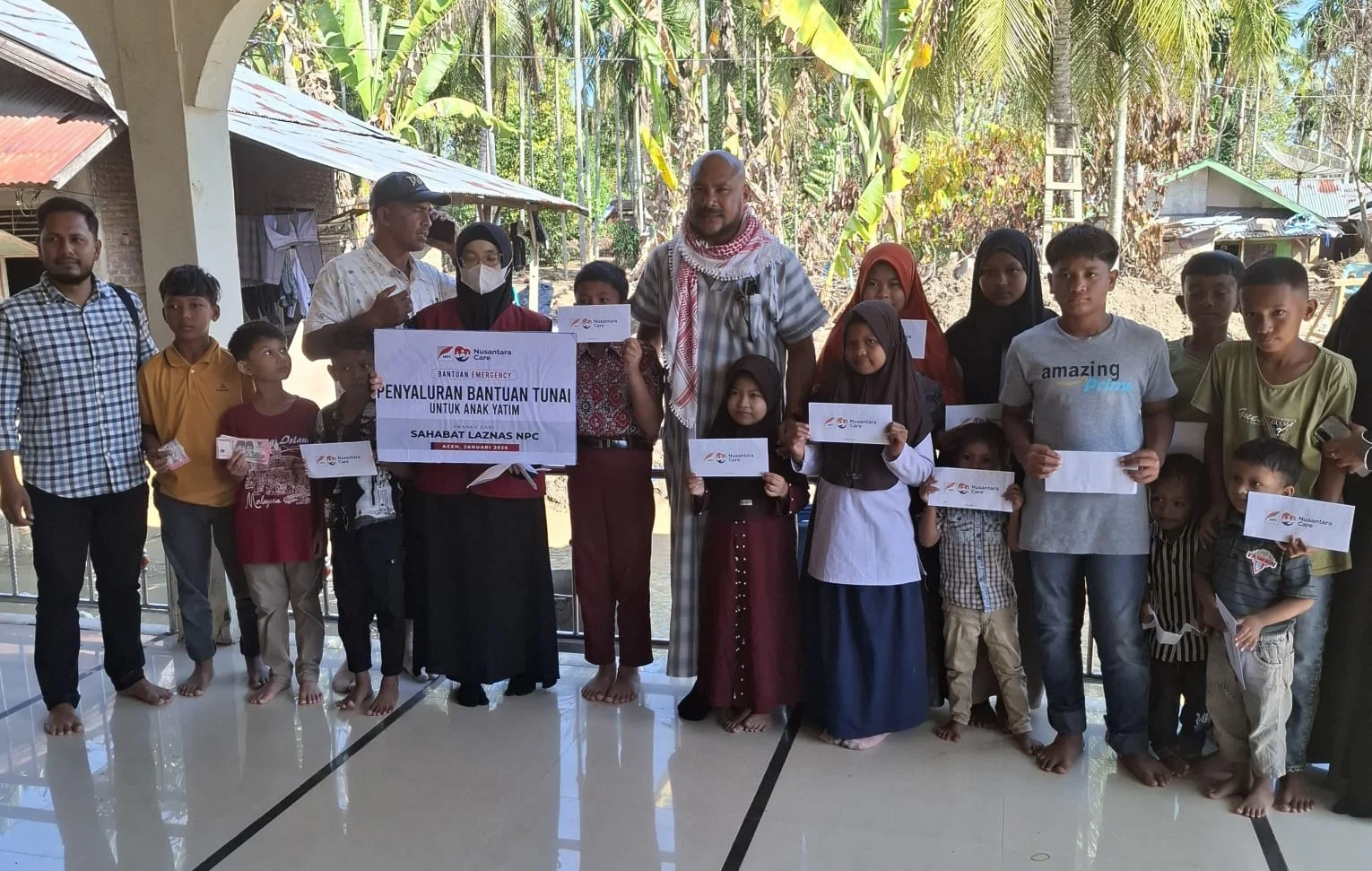 Peduli Pendidikan di Tengah Bencana, NPC Salurkan Santunan Yatim dan Bantuan Pendidikan di Pidie Jaya